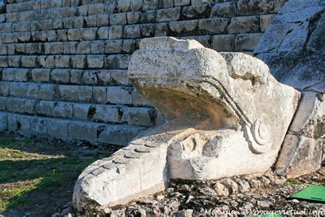 Snake Head At The Foot Of The Pyramid Of Kukulcan Chichen Itza Mexico