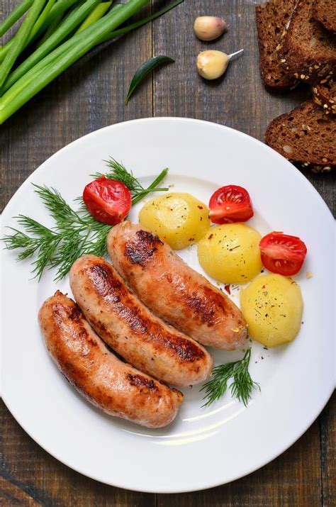 Fried Sausages and Boiled Potatoes Stock Photo - Image of nutrition ...