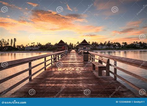 Early Sunrise Over the Naples Pier on the Gulf Coast of Naples, Stock ...