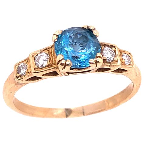 14 Karat Yellow Gold Ring Princess Cut Three Blue Topaz With Diamond