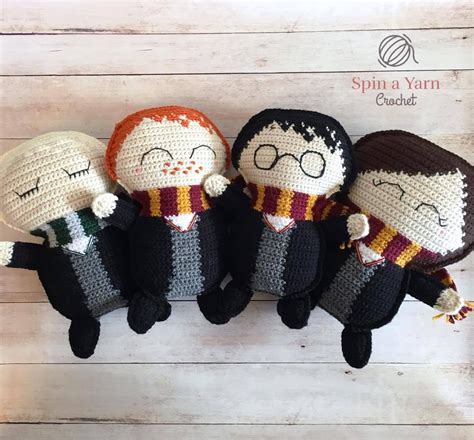 Crocheted Harry Potter Dolls Are Lined Up In A Row