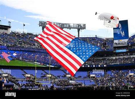 A Member Of The Leap Frogs Airmen Parachute Into Mandt Bank Stadium With