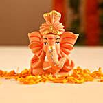 Buy Send Ganesha Idol With Matki Diyas N Sweets Online Fnp