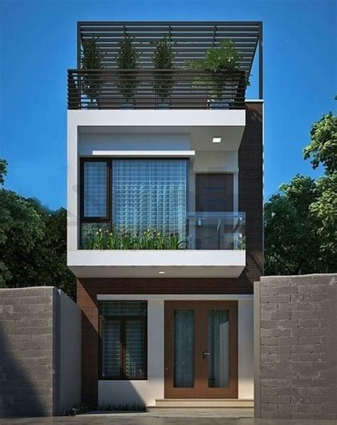 The Front View Of A Modern House With Balcony And Balconies