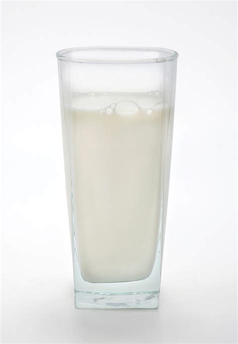 Glass of milk against a white background - StockFreedom - Premium Stock Photography