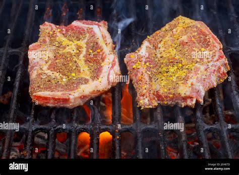 Beef Steak Cooking Over Flaming Grill Stock Photo Alamy