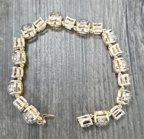 14 Karat Yellow Gold Diamond Link Bracelet With White And Conac Brown