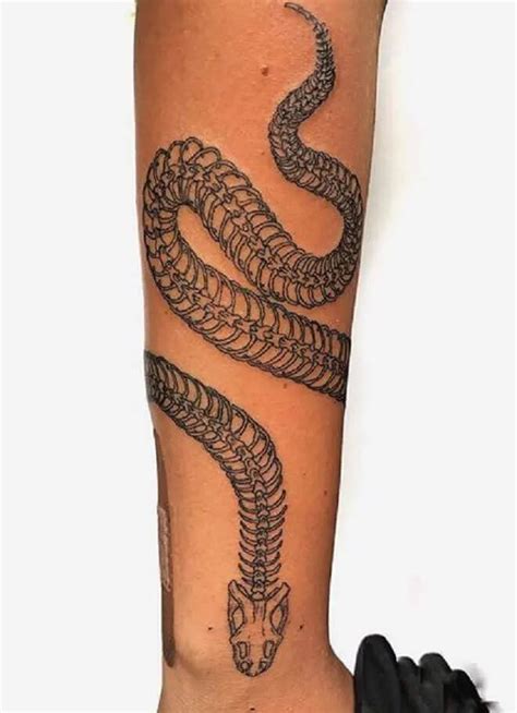 15 Snake Skeleton Tattoo Designs Ideas Hand Tattoos Skeleton