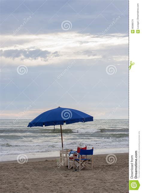 Beach Umbrella And Chairs Next To The Sea Stock Photo Image Of