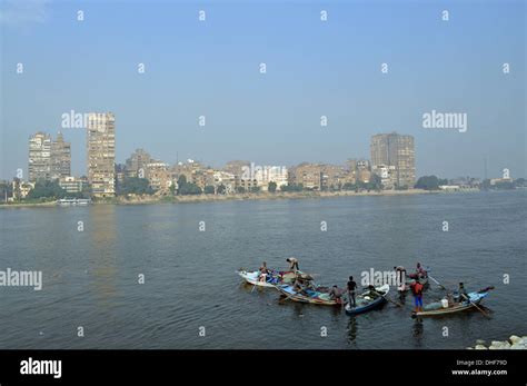 Local Fishermen Off Corniche El Nil On The Right Bank Of The Nile River