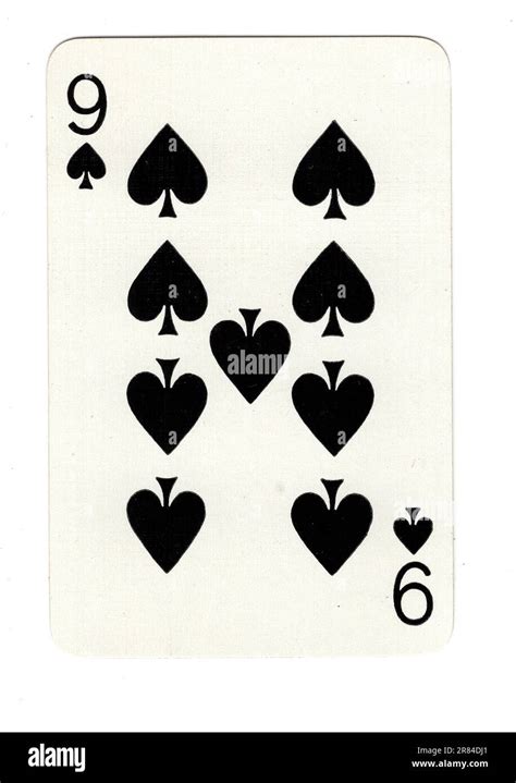 A Nine Of Spades Vintage Playing Card On A White Background Stock Photo