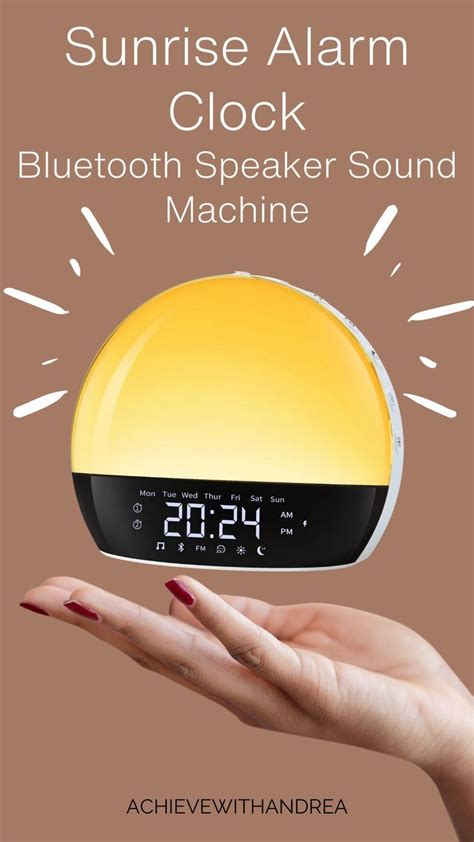 A Woman S Hand Holding An Alarm Clock With The Words Sunrise Alarm