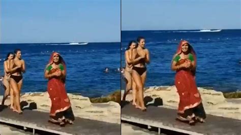 Woman In Saree With A Ghunghat Walks On Beach Amid Bikini Clad Women Desi Netizens React India Tv