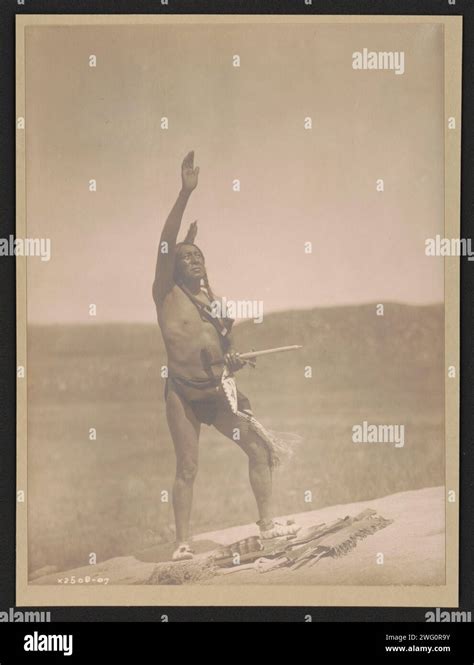 Invocation Sioux C1907 Photographs Shows A Dakota Man Wearing Breechcloth Holding Pipe With