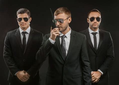 Premium Photo Handsome Bodyguards On Dark Background Bodyguard