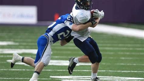 Regina Running Back Jake Brinkman Runs The Ball Against West Lyon In