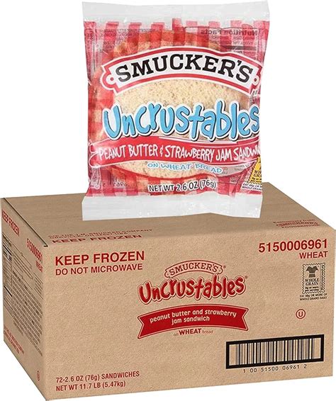 Smuckers Uncrustables Peanut Butter And Strawberry Jam Sandwich On