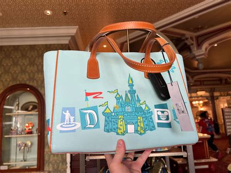 NEW Fantasyland Dooney Bourke Collection Has Arrived In Disney World