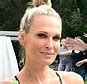Molly Sims Showcases Her Killer Bikini Body As She Lounges On Swing In Leopard Print