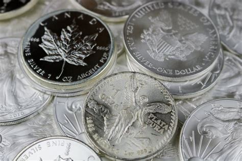 Background Of Silver Bullion Coins Stock Photo - Image of plastic ...