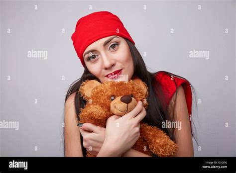 Brunette With A Teddy Bear Stock Photo Alamy