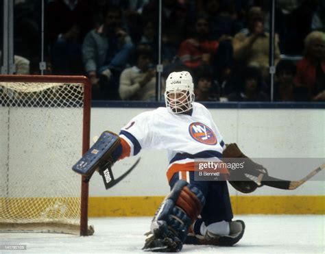 Goalie Billy Smith of the New York Islanders makes the save during an... News Photo - Getty Images