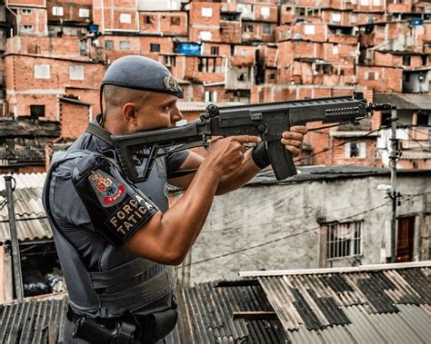 Brazilian Tactical Force Officer During Patrolling In The Favela 19th Metropolitan Military