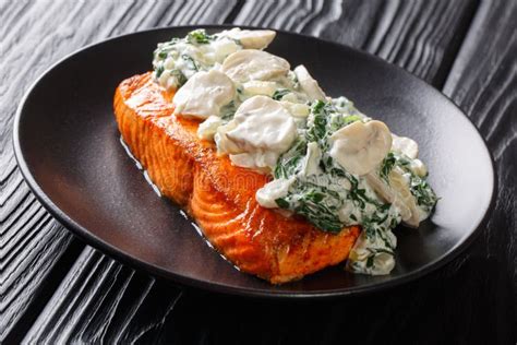 Italian Salmon Fillet Recipe Consists Of Topped With Creamy Spinach And