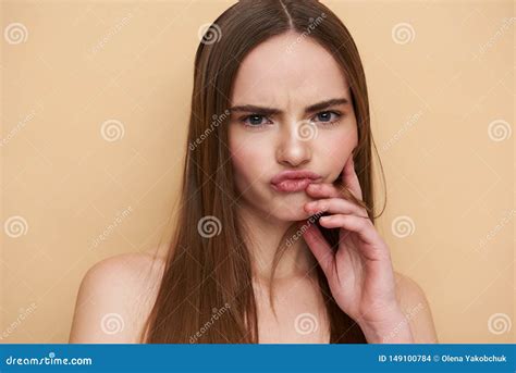 Young Lady Frowning And Puckering Her Lips Stock Photo Image Of Young