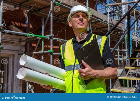 Male Builder In Helmet Closeup Upset In Shock Holding His Head Fire