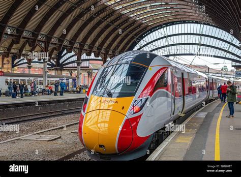 The New Azuma Bullet Shaped Train Of The Lner Beside A Platform At