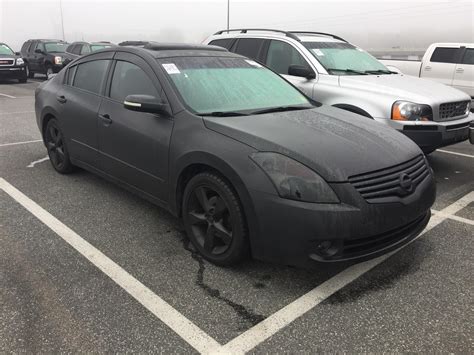 This Blacked Out Altima Rnissan