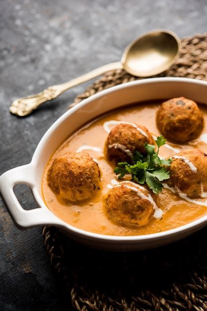 Premium Photo Malai Kofta Curry Is A Mughlai Special Recipe Served In