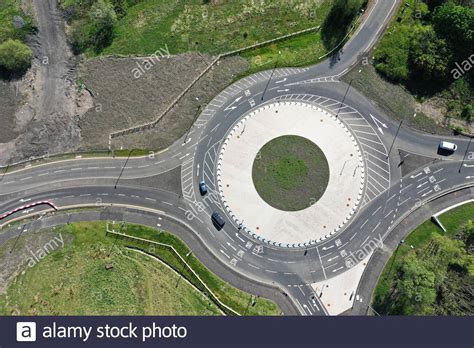 Overhead aerial drone view of roundabout Stock Photo - Alamy