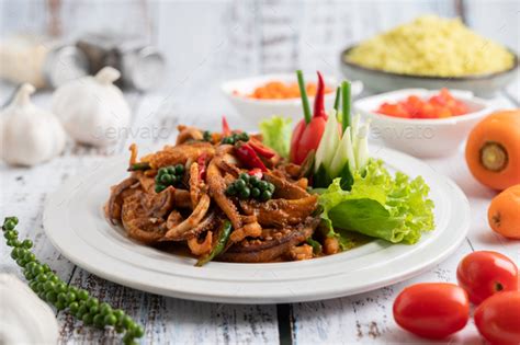 Stir Fried Squid With Curry Paste In White Plate Stock Photo By