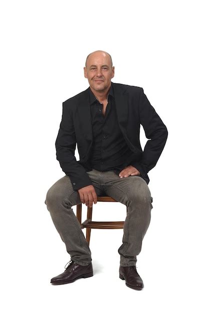 Premium Photo Front View Of A Bald Man Sitting On Chair On White