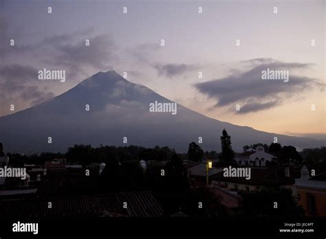 Guatemala, Antigua Guatemala, volcano Agua, town view Stock Photo - Alamy