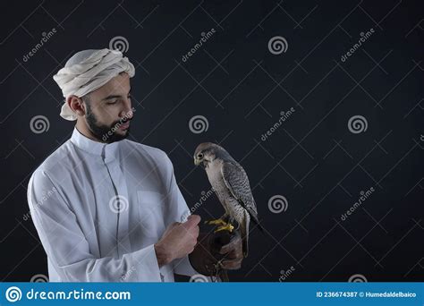 Young Falconer Holding A Bird Of Prey Stock Image Image Of Falcon