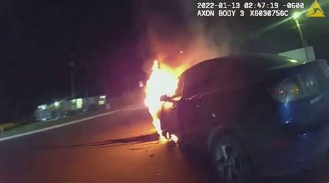 Texas Police Officer Rescues Woman Trapped In Burning Car Bodycam