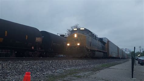 Southbound CSX Autorack On Track Two Meets Northbound NS Mixed Manifest