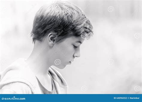 Portrait of a teenage boy stock photo. Image of light - 64096552