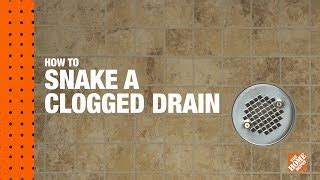 How To Snake A Clogged Drain A Diy Digital Workshop Doovi