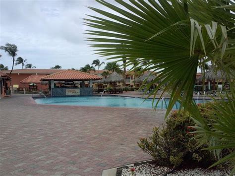 Pool Area And Bar Picture Of Aruba Beach Club Resort Palm Eagle