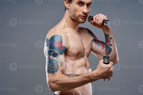 Tattooed Guy Naked Torso Muscled Dumbbells Fitness Sport 22642109 Stock Photo At Vecteezy