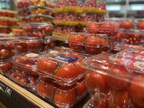 Retail Grocery Store Tomato Variety Display Produce Department