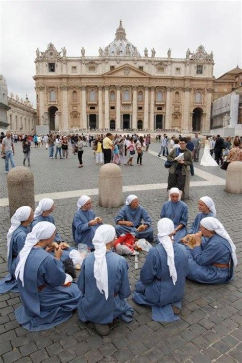 Nuns Eating A Quick Lunch In The Plaza In Front Of St Peters Basilica