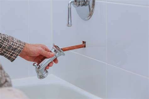 How To Replace A Bathtub Faucet In 4 Easy Steps