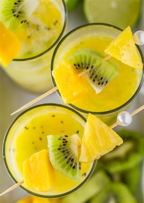 Coconut Tropical Rum Cocktail With Mango Kiwi And Pineapple Linger