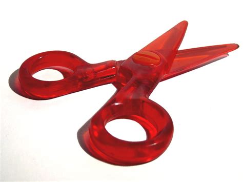 Free red plastic scissors Stock Photo - FreeImages.com