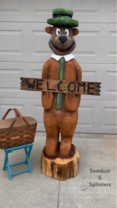 Chainsaw Carving Of Yogi Bear Created By Sawdust And Splinters Of